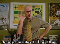 a bald man wearing glasses and a yellow tie says let me get this as straight as i can get things