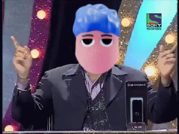 a man with a pink face and a blue hat is on a sony television channel