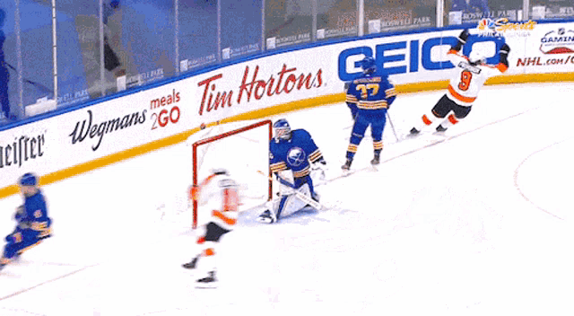 a hockey game is being played in philadelphia and the sponsors are seico and tim hortons