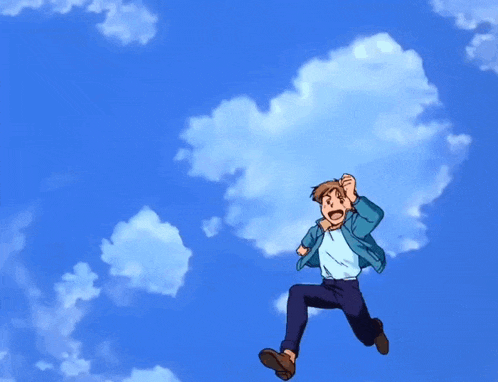 a young man in a blue jacket is jumping in the air