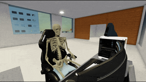 a skeleton sits in a chair that says aorus on it