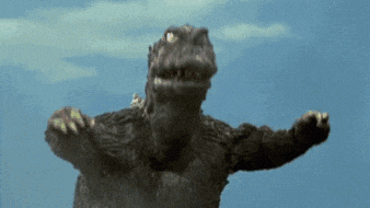 a monster is flying through the air with its arms outstretched against a blue sky .
