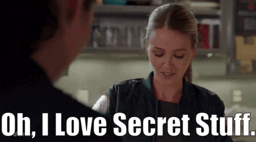 a woman is talking to a man and says oh , i love secret stuff