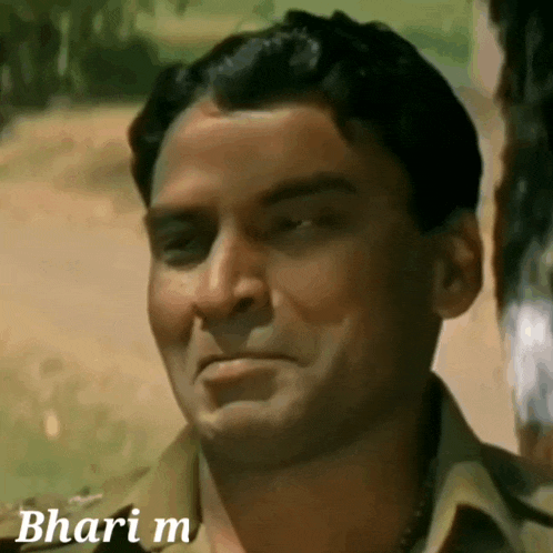 a close up of a man 's face with the words " bhari m " above him