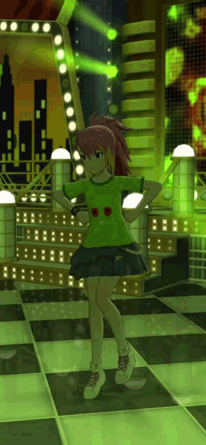 a girl in a green shirt is dancing on a dance floor