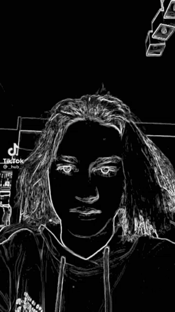 a black and white drawing of a person 's face
