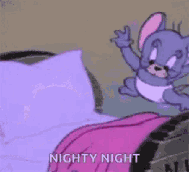 a cartoon mouse is sitting on top of a bed with a pink blanket .
