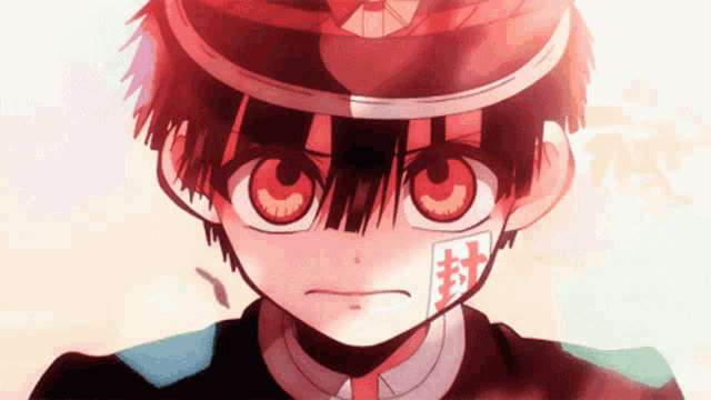 a close up of a cartoon character with chinese characters on his face