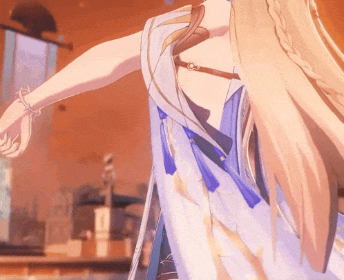 a woman with long blonde hair is wearing a blue and gold dress