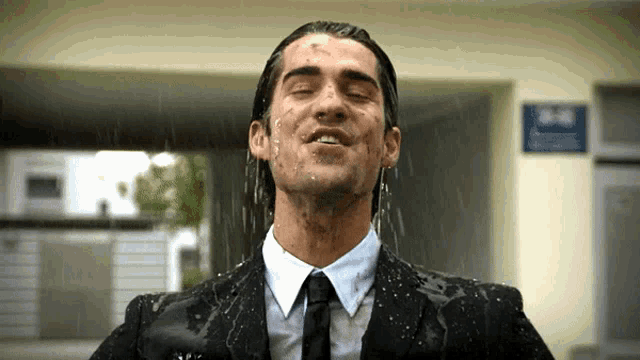 Shower Wet GIF - Shower Wet Wet Suit GIFs