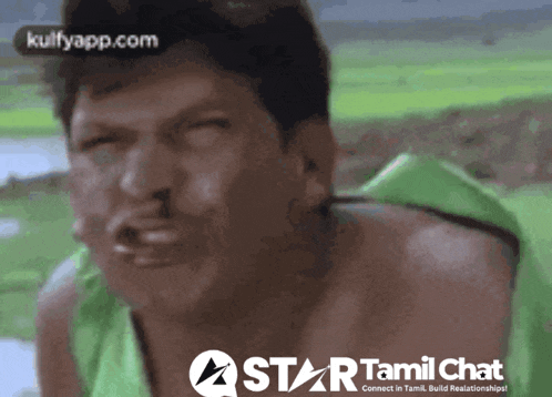 a man is making a funny face in front of a star tamil chat banner