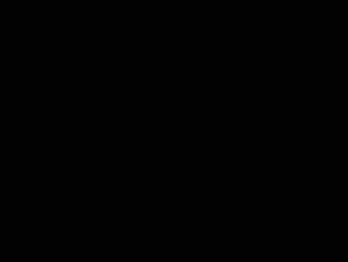 a black background with a few white dots on it .