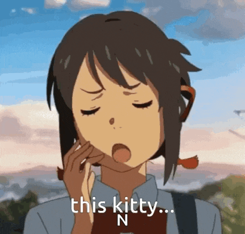 a girl is yawning with her eyes closed and the words `` this kitty ... n '' written on the bottom of her face .