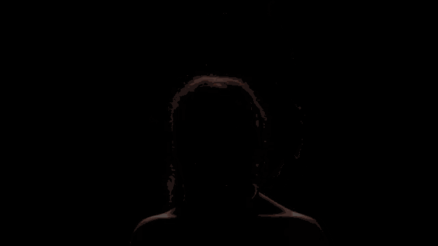 a naked woman with a large afro is wearing a choker