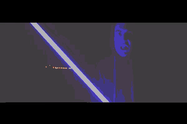 a man in a hoodie is holding two lightsabers in his hands