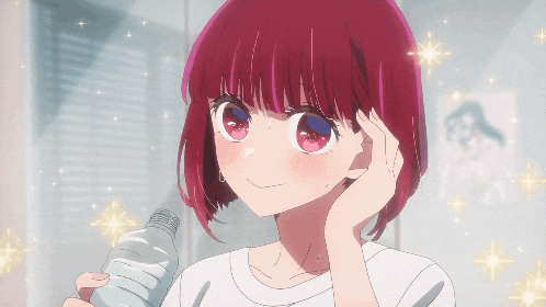 a girl with red hair is holding a bottle