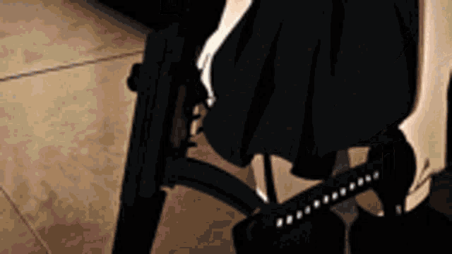 a girl in a black dress is holding a gun and a sword