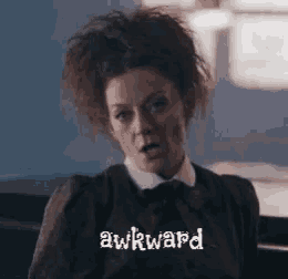 a woman with a bow tie says awkward