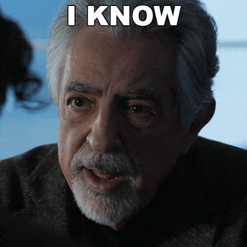 a man with a beard has the words i know above his head