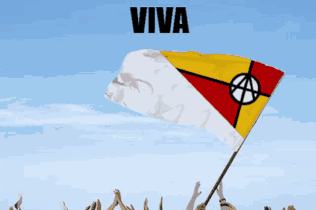 a group of people holding up a flag that says ' democratti '