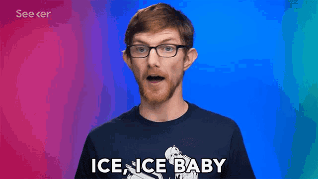 a man wearing glasses and a blue shirt that says ice ice baby