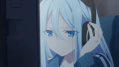 a girl with long white hair wearing headphones