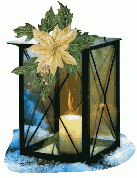 a lantern with a candle inside of it and a yellow flower on top