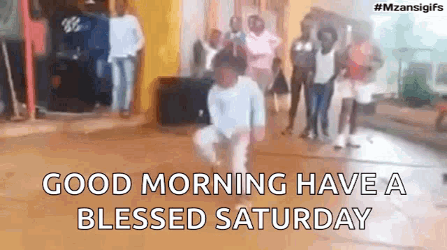 a group of people are standing in a room and a child is dancing in front of them .