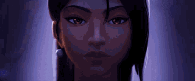 a close up of a woman 's face with her eyes closed and a light shining on her face .