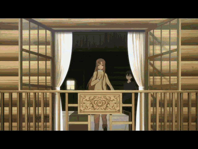 a girl stands on a balcony with a sign that says ' a ' on it