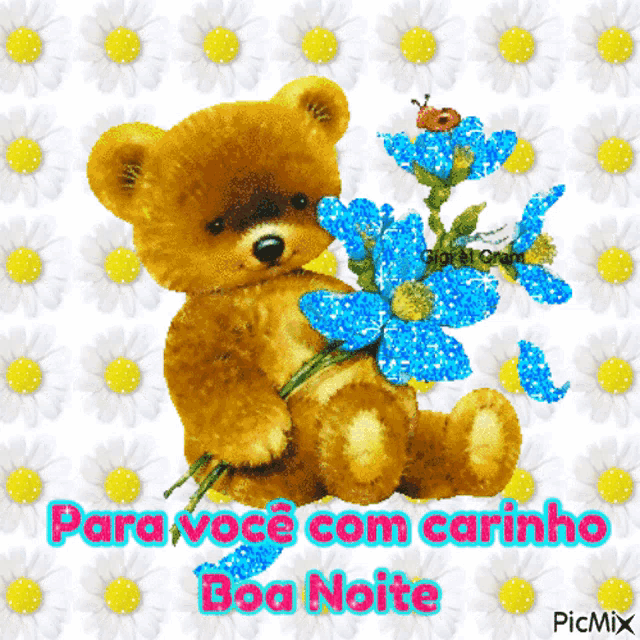 a picture of a teddy bear holding a blue flower and the words para voce com carinho boa noite