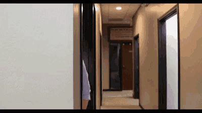 a hallway with a sign on the wall that says ' a '
