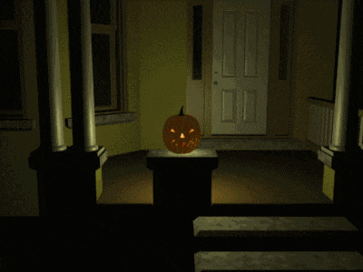 a carved pumpkin sits on a pedestal in front of a white door