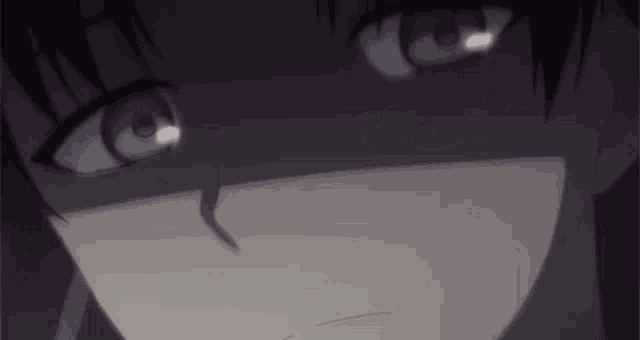 a close up of a person 's face with their eyes closed and their mouth open .