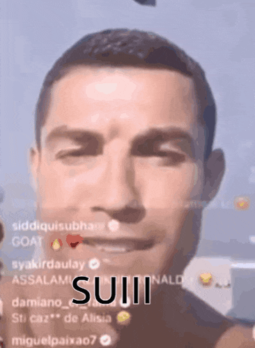 a close up of a man 's face with the words suii on it