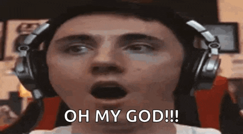 a man wearing headphones is making a surprised face and saying `` oh my god ! ''