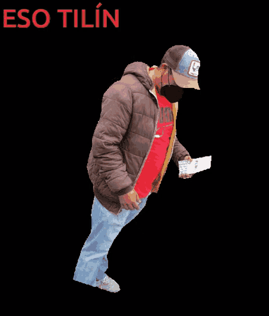a man wearing a mask and a hat is standing in front of a black background with the word eso tilin above him