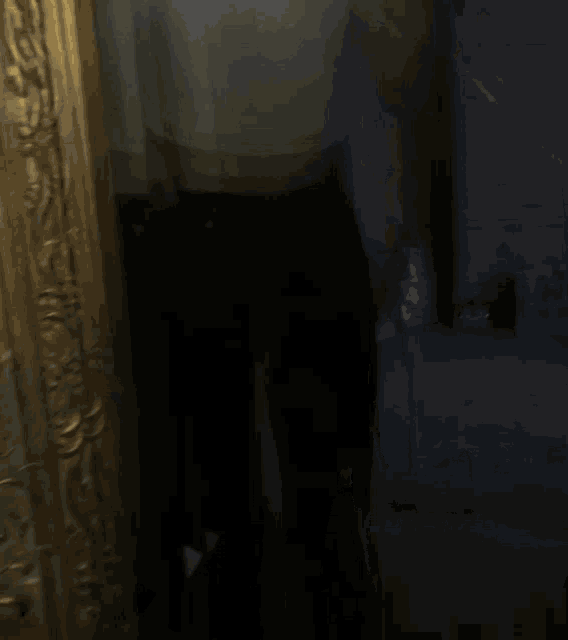 a person is taking a selfie in the dark with a light shining on them
