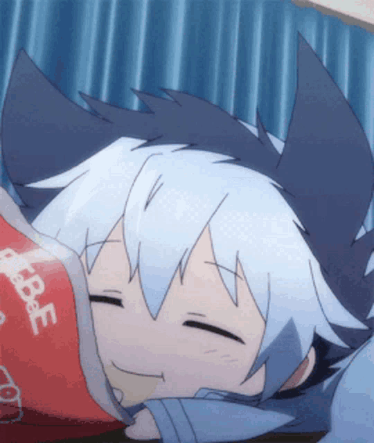 a cartoon character laying down with a blanket that says free