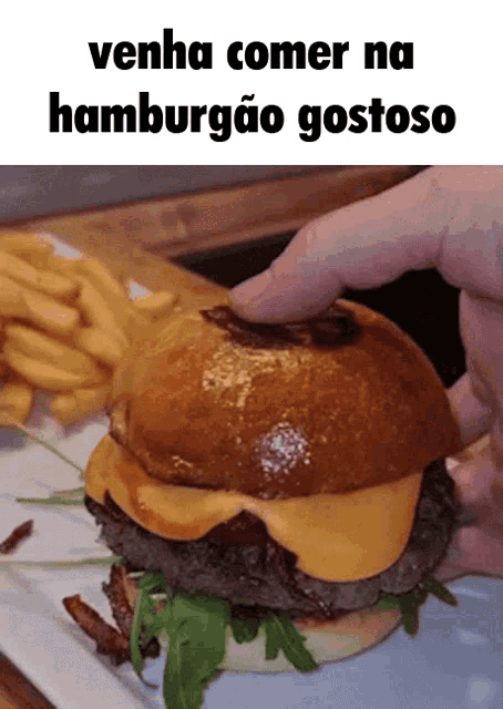 a picture of a hamburger with the words venha comer na hamburgao gostoso