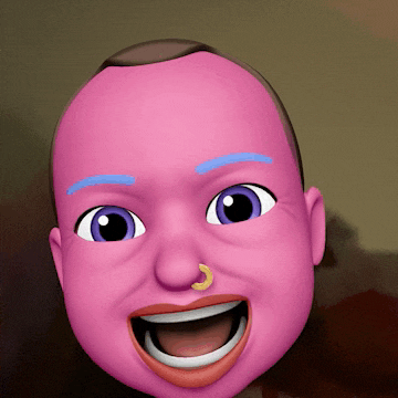 a pink cartoon face with purple eyes and a yellow nose ring