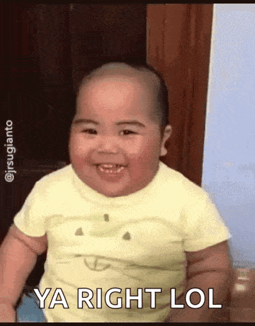 a baby is smiling and saying `` ya right lol '' while sitting down .