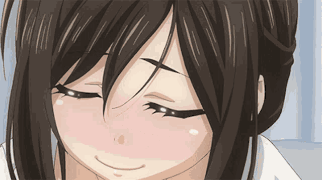 a close up of a girl 's face with her eyes closed and her mouth open