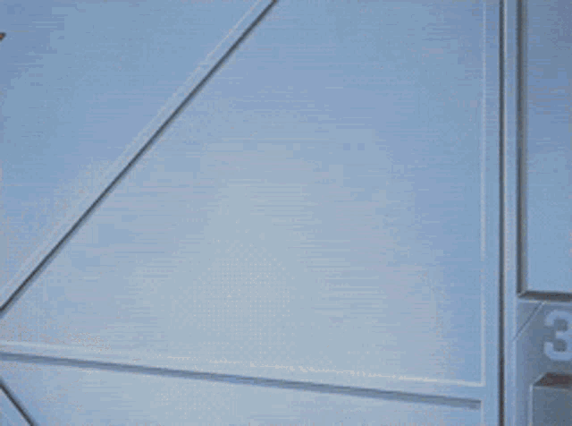a cartoon character is peeking out of a door