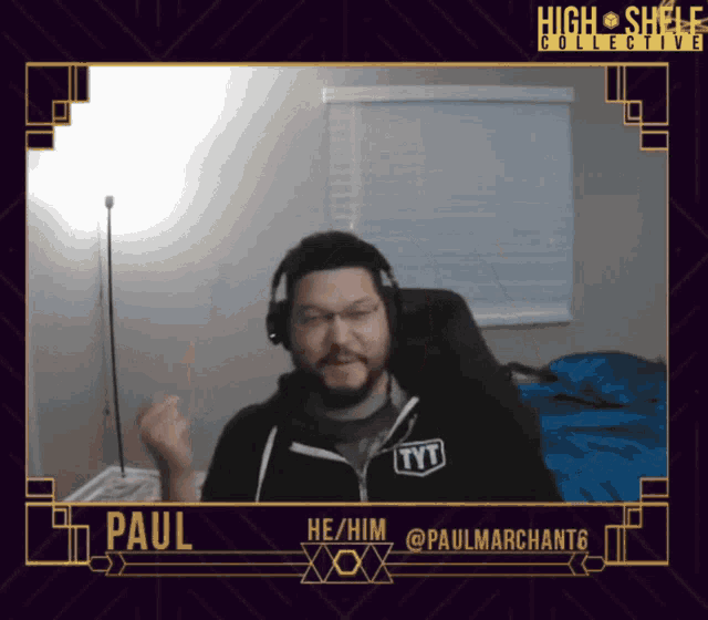 a man wearing headphones is on a screen with the name paul on it
