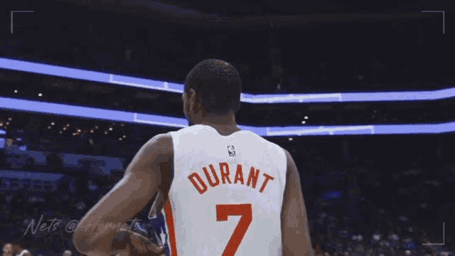 a basketball player wearing a jersey with the number 7 on it