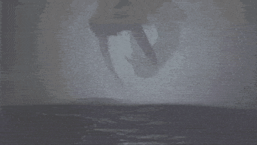 a giant squid is flying over the ocean in the fog .