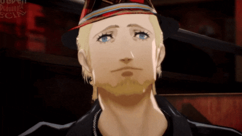 a man with a beard is wearing a hat with a red band around it