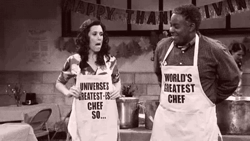 a man and a woman wearing aprons that say `` world 's greatest chef so ... ''