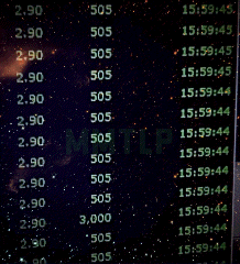 a screen displays the time and mmtlp in green letters